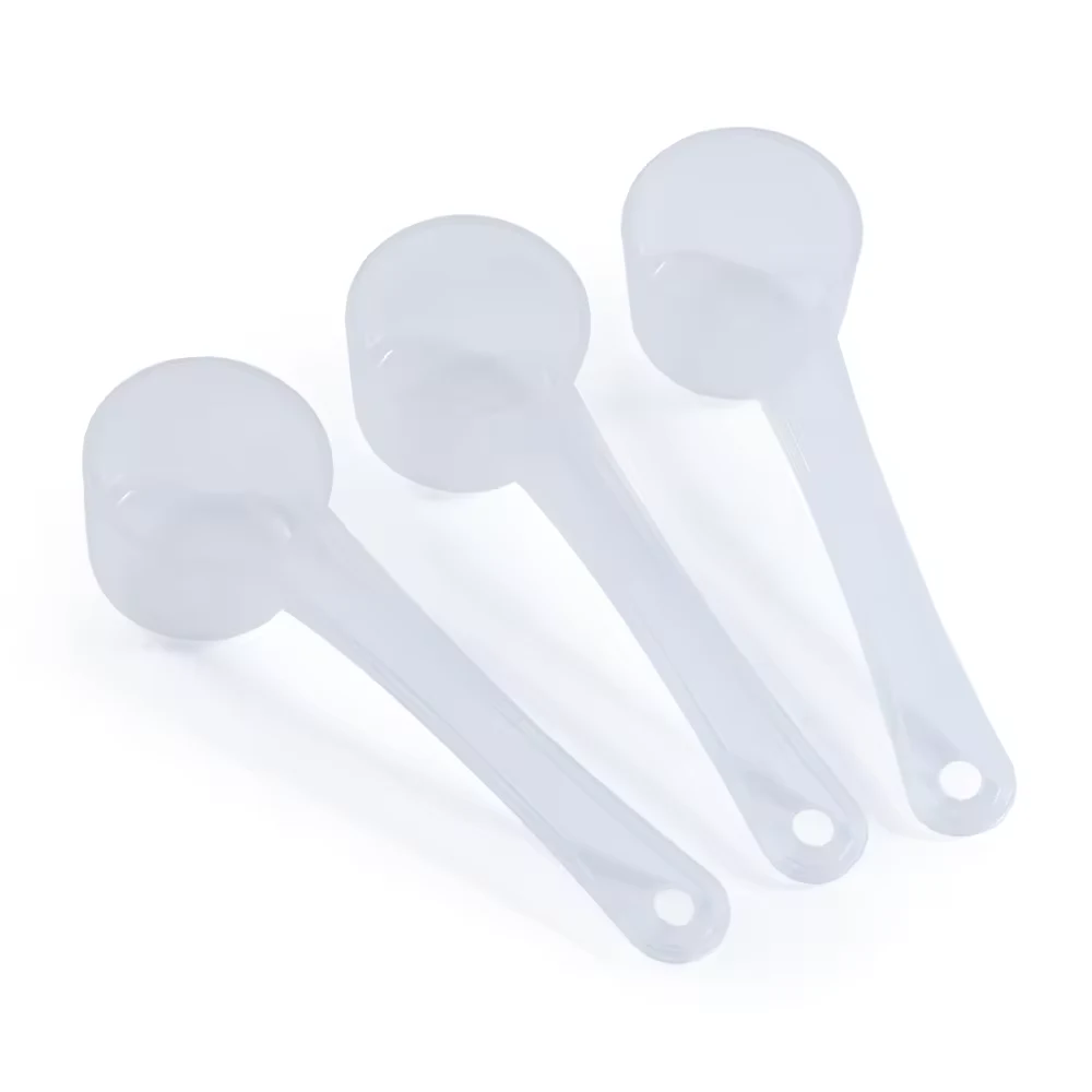Ten millilitre flat-bottom PP measuring scoop with a hanging hole