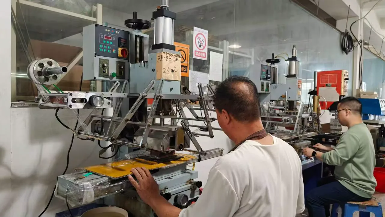 Team operating transfer equipment in the factory